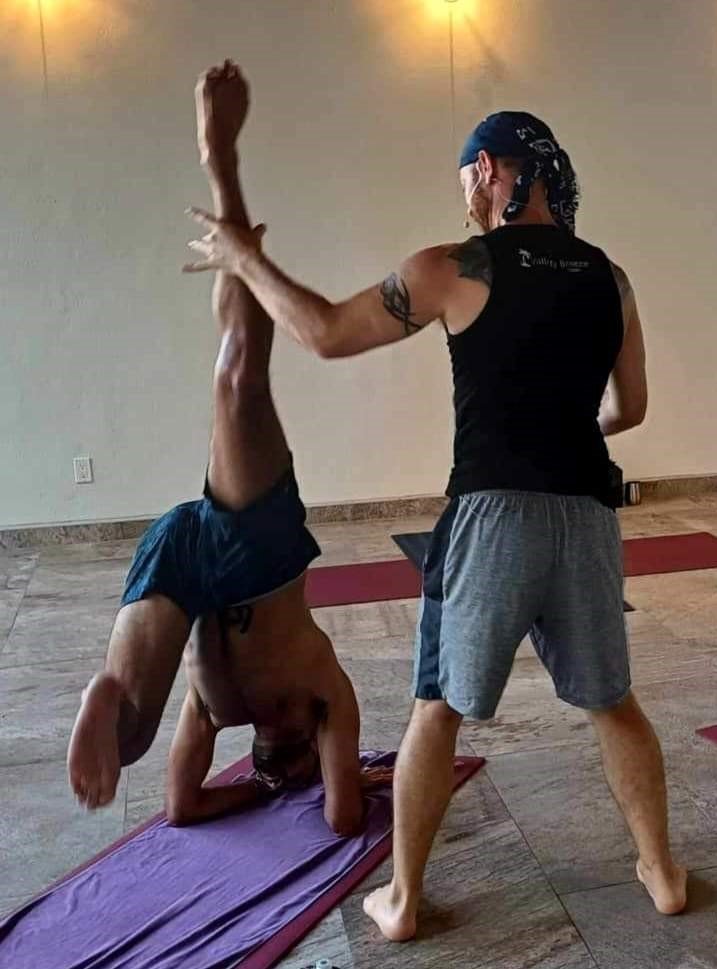 Private Yoga Instruction Yoga Teacher/Trainer Jai Salsbery teaching Forearm Stand in the Vallarta Breeze Yoga Puerto Vallarta Yoga Studio