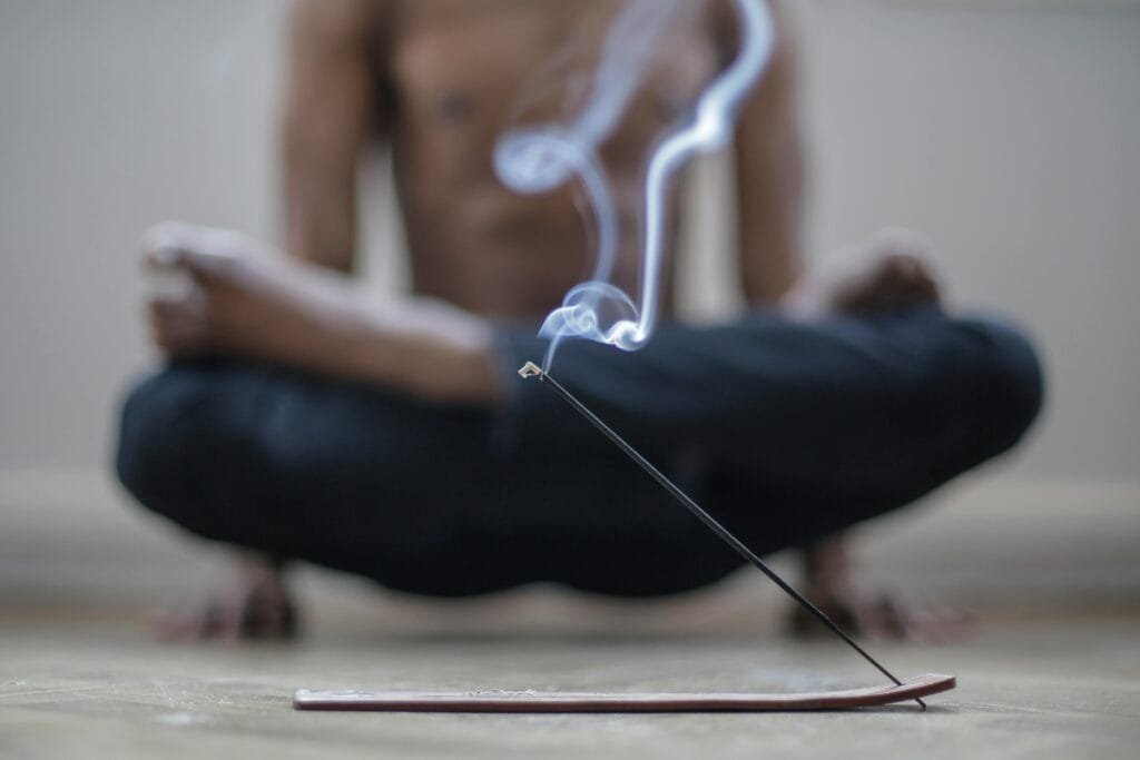 pexels-photo-3965398-3965398 Man Using Incense while Doing Yoga