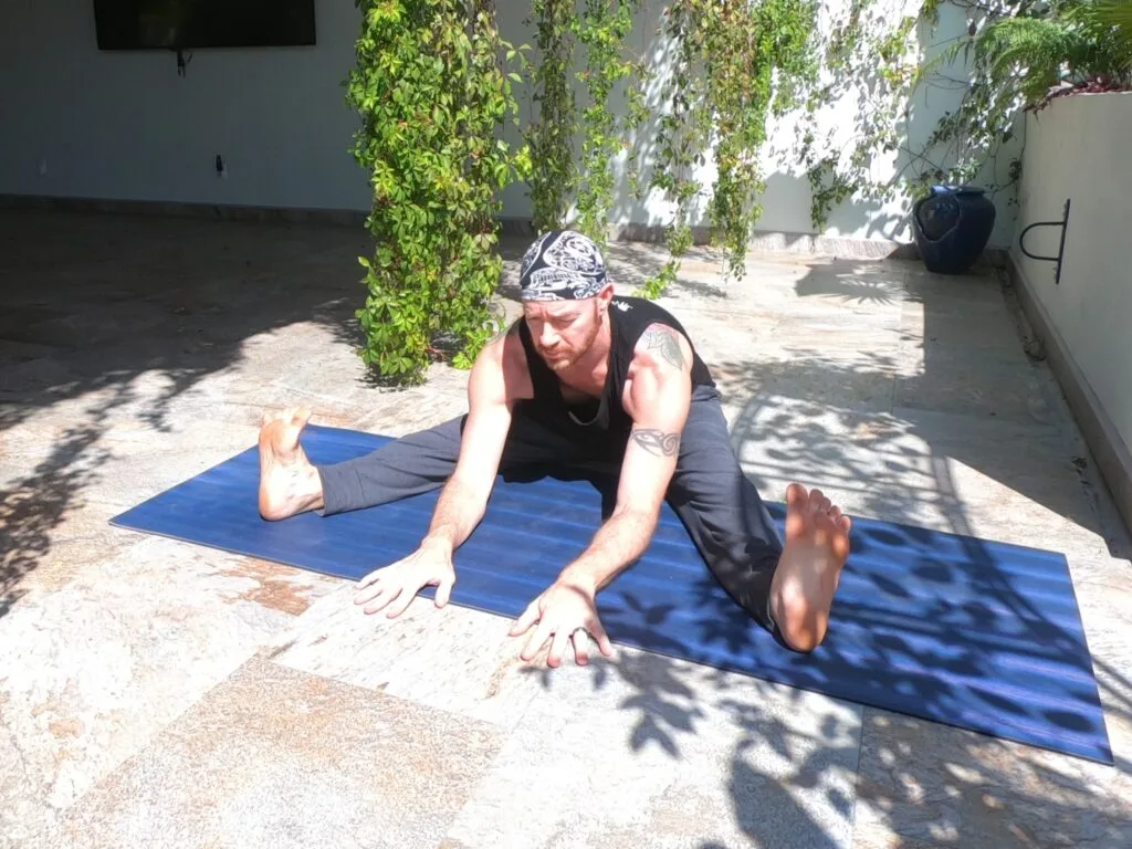Wide Seated Forward Bend light aka Upavistha Konasana aka Pancake Performed by Jai Salsbery at the Vallarta Breeze Yoga Puerto Vallarta Yoga Studio
