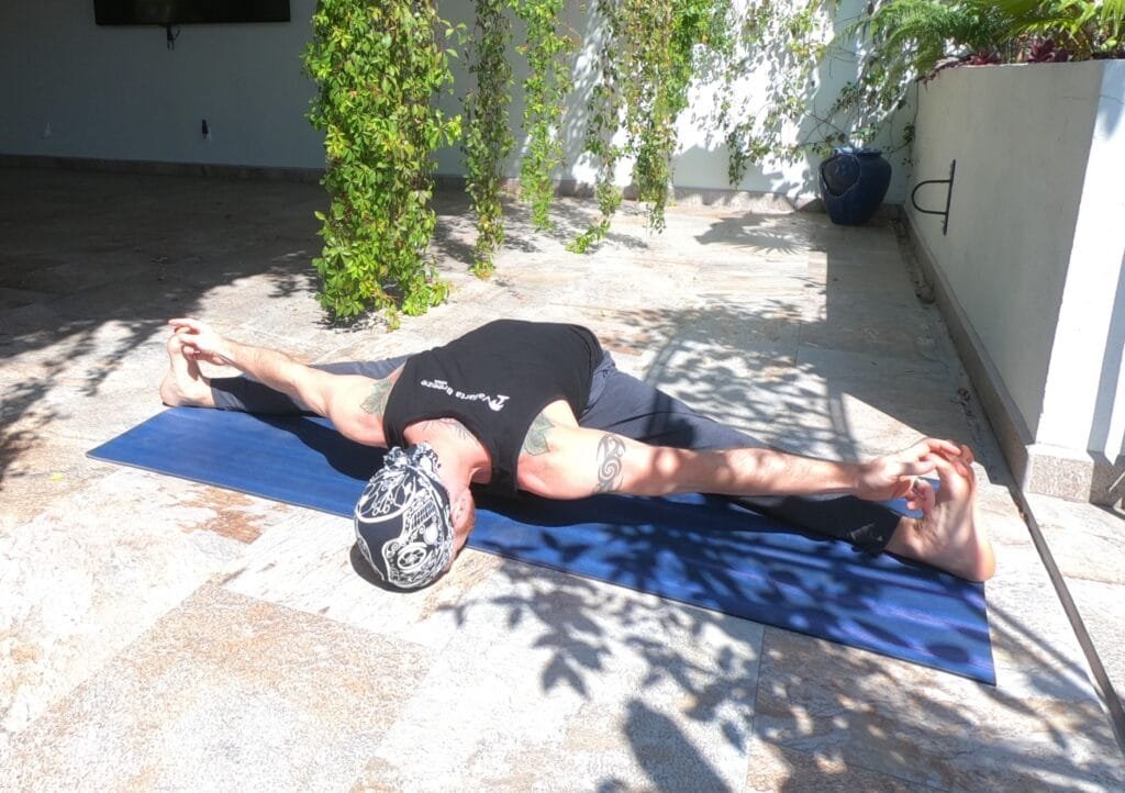 Wide Seated Forward Bend with Toes aka Upavistha Konasana aka Pancake Performed by Jai Salsbery at the Vallarta Breeze Yoga Puerto Vallarta Yoga Studio