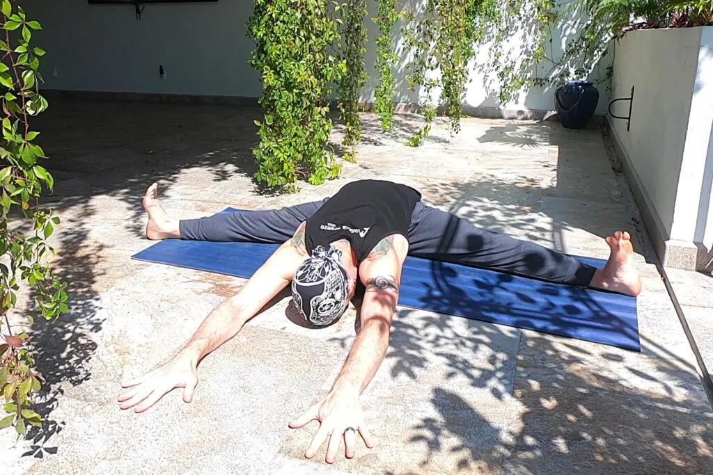 Wide Seated Forward Bend aka Upavistha Konasana aka Pancake Performed by Jai Salsbery at the Vallarta Breeze Yoga Puerto Vallarta Yoga Studio